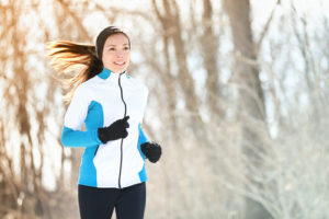 Running woman in a winter season